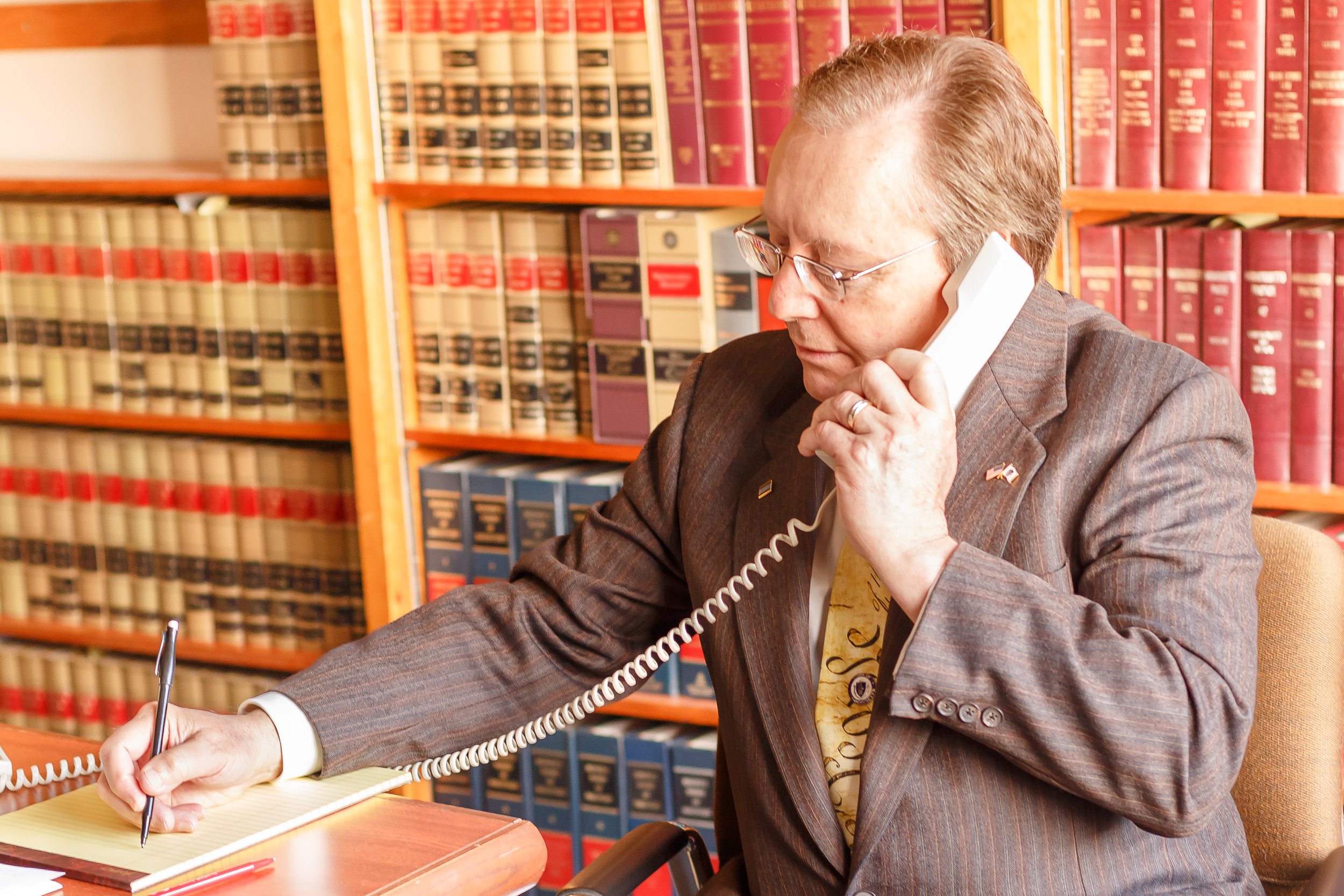 Attorney Jay McMahon working in his Buzzards Bay law office